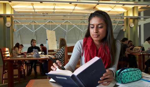 A student reading closely
